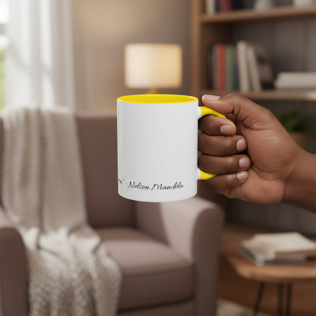 White mug with yellow interior and handle featuring 'Nelson Mandela' text.